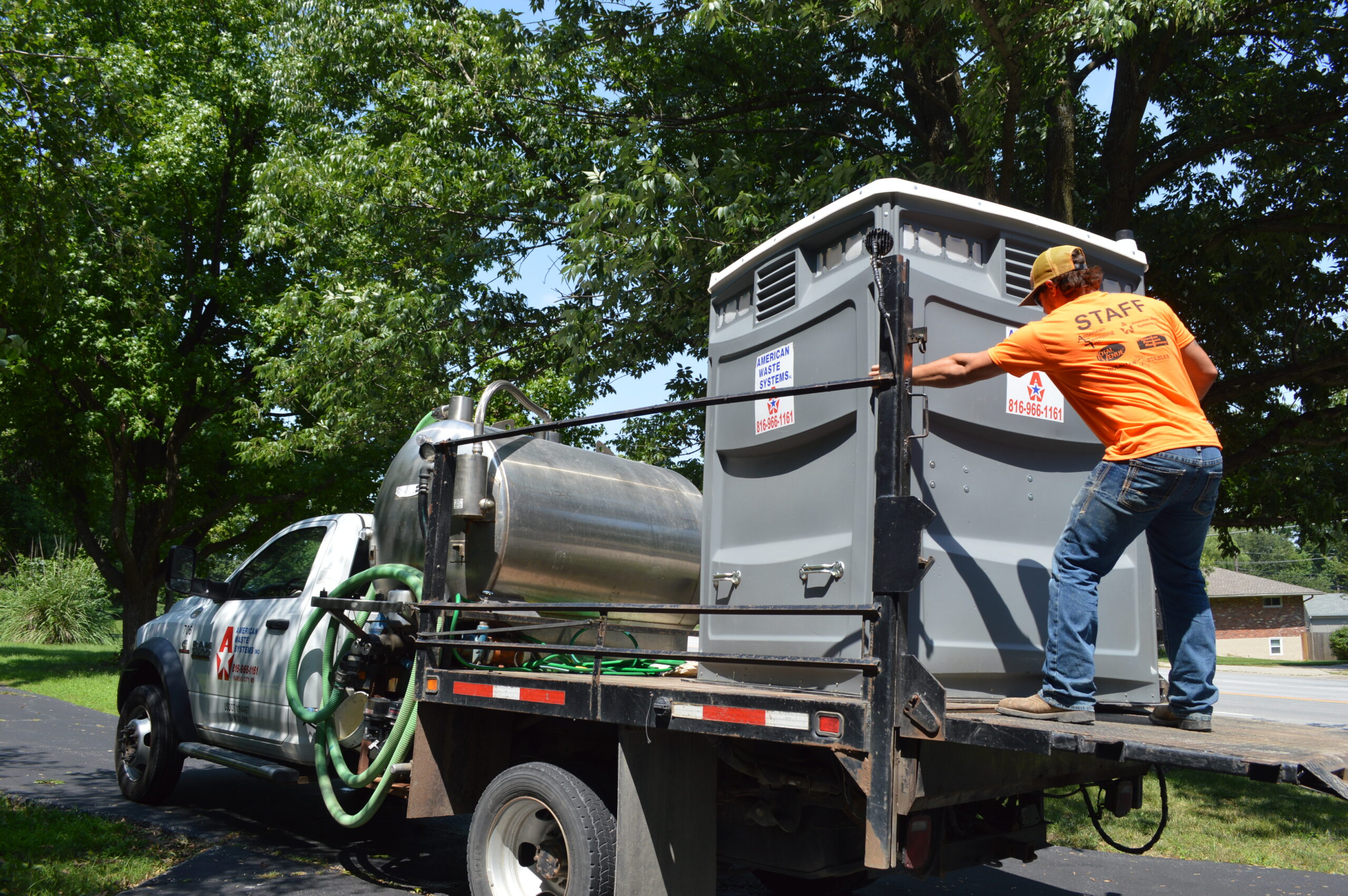 Total Venue moving construction portable toilets around Kansas City home remodel